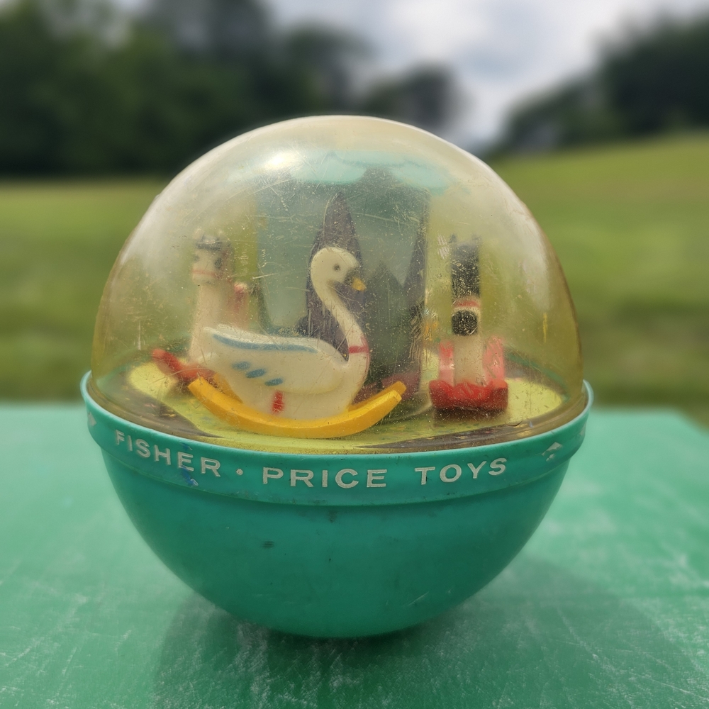 Vintage Fisher-Price Teal and Yellow Roly-Poly Toy